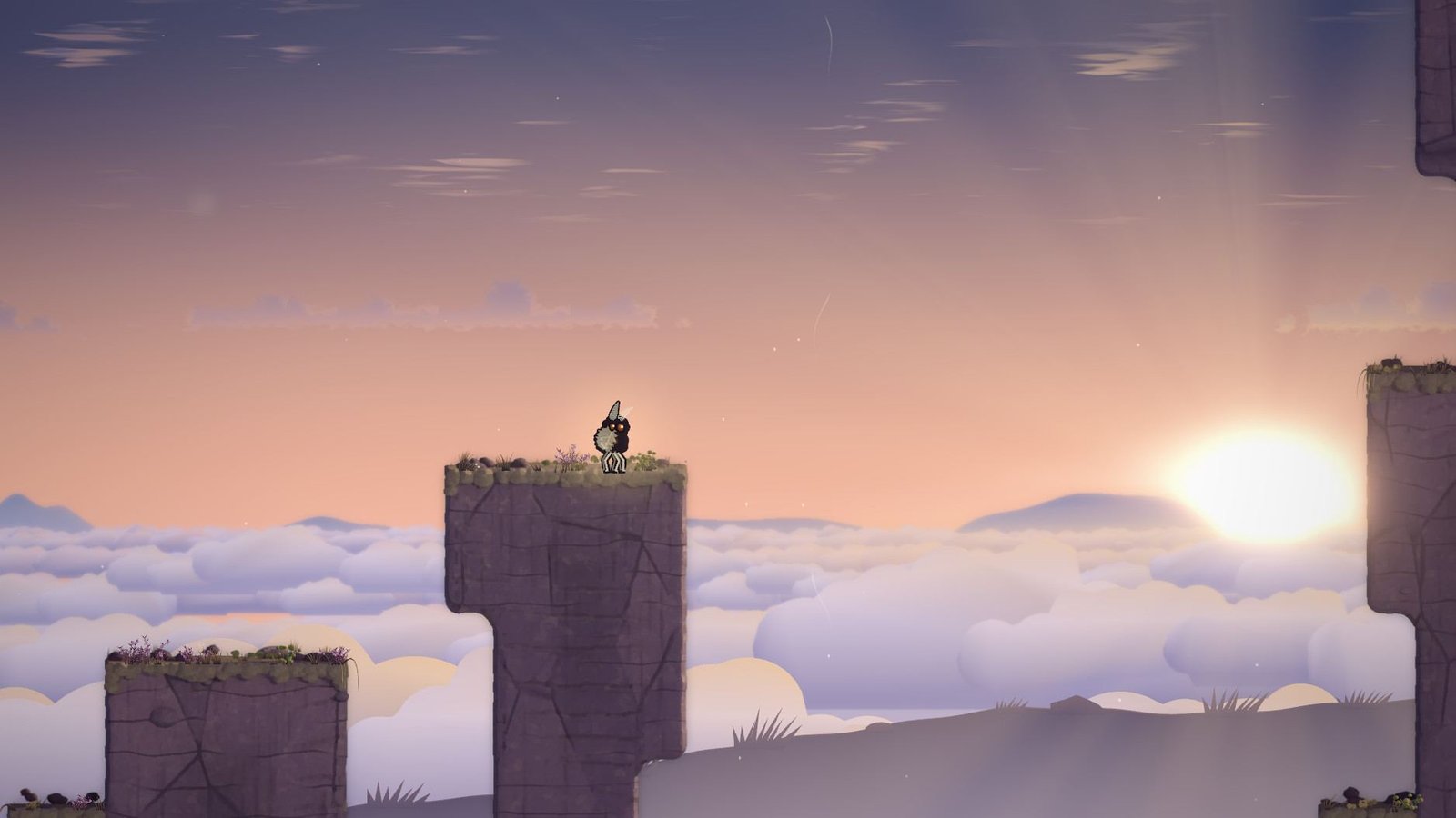Sunrise over a sea of cloud, the moth standing on top of a stone pillar.